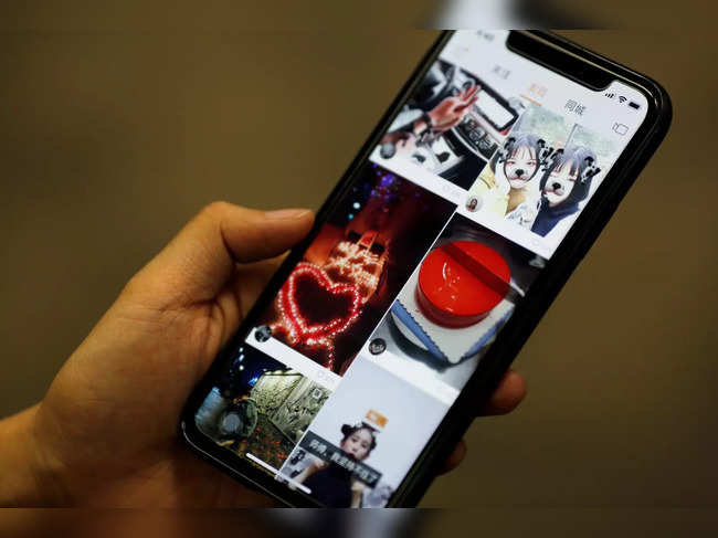 FILE PHOTO: Illustration picture of video-streaming app Kuaishou on a mobile phone