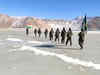 ITBP jawans march with national flag on frozen water body in Ladakh on Republic Day