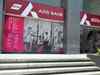 Axis Bank shares decline over 2% in early trade; bounces back later