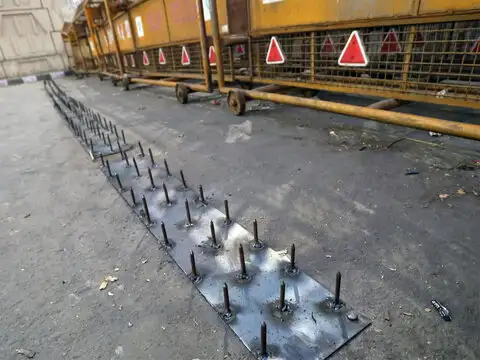 Nails on roads adjoining highway