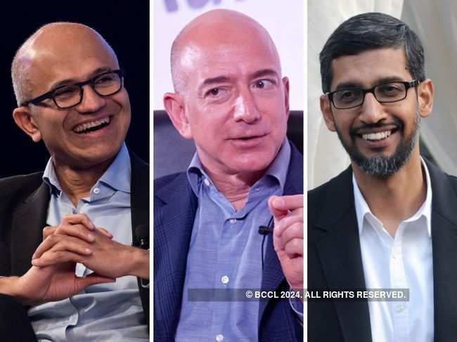 ​Satya Nadella (L) and Sundar Pichai (R) congratulate Jeff Bezos (C) on new role.
