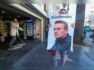 Protesters march in Hollywood during a demonstration in support of Russian opposition leader Alexei Navalny