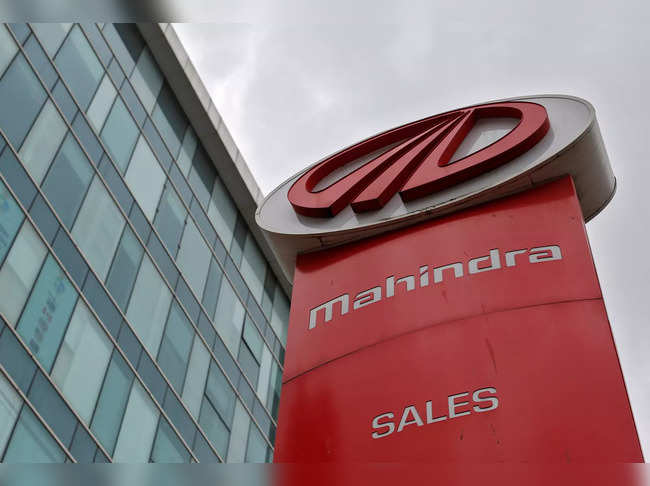 FILE PHOTO: The logo of Mahindra and Mahindra is seen at a showroom in Mumbai