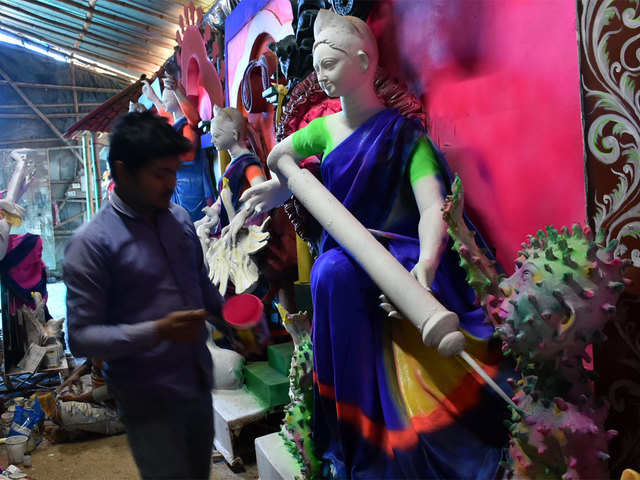 COVID themed idols of Goddess Saraswati