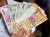 Rupee pares initial losses, settles 9 paise up at 72.65 against US dollar