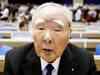 Suzuki Motor's 91-year-old chairman Osamu Suzuki waves goodbye after decades-long career