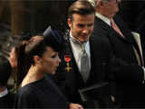 David Beckham and British designer Victoria Beckham attend the wedding service