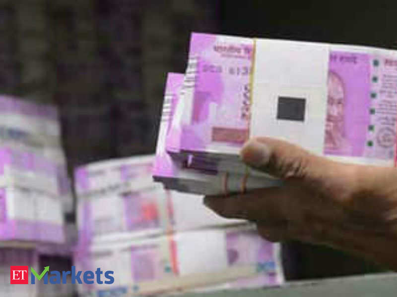 Rupee tanks 104 paise to close at  against US dollar - The Economic  Times