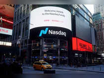 FILE PHOTO: The NASDAQ market site displays an AirBnb sign on their billboard on the day of their IPO in Times Square