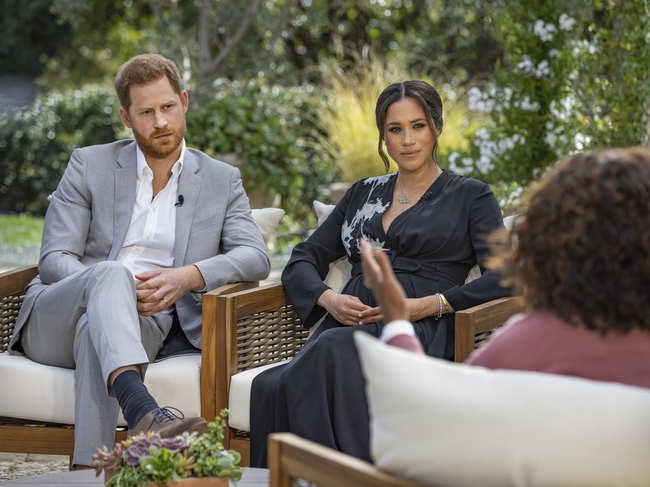 ​This image provided by Harpo Productions shows Prince Harry, from left, and Meghan, in conversation with Oprah Winfrey.​