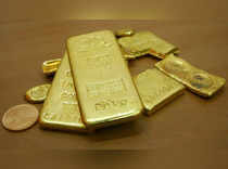 FILE PHOTO: Gold bars are displayed at a gold jewelry shop in Chandigarh