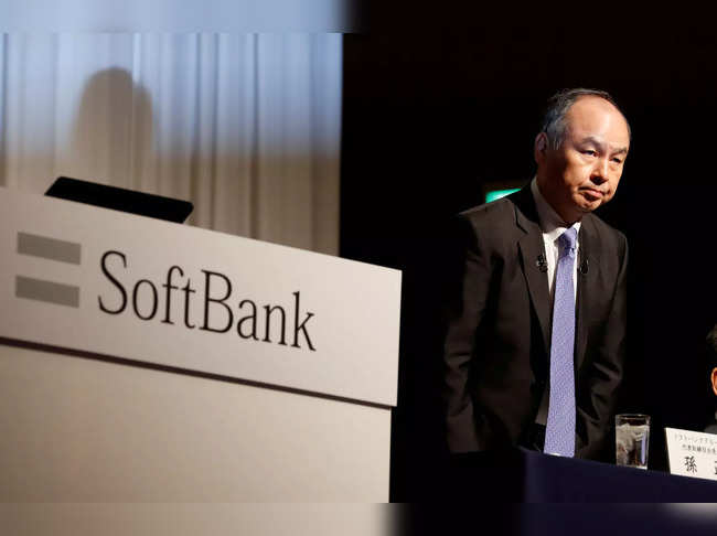 FILE PHOTO: Japan's SoftBank Group Corp Chief Executive Masayoshi Son attends a news conference in Tokyo