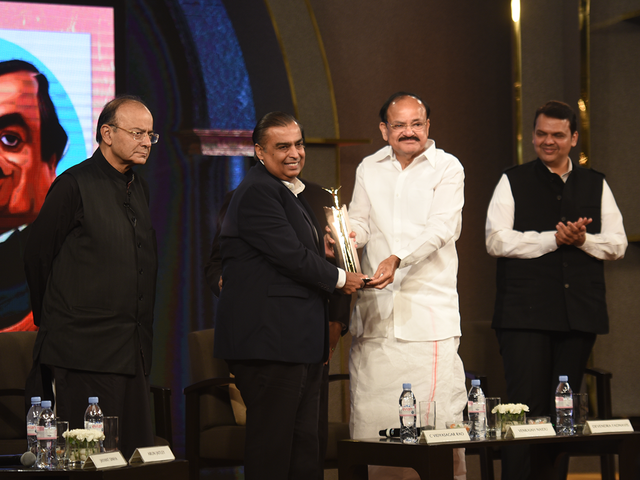 Mukesh Ambani receives the award for 'Business Leader of The Year' at the ET Awards 2017
