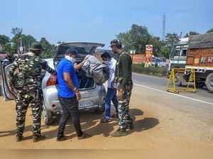 Gaya: Central Reserve Police Force (CRPF) personnel carry out vehicle checking d...