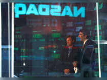 FILE PHOTO: Journalists report from the studio at the NASDAQ Market Site in Times Square in New York