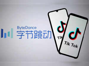 FILE PHOTO: Tik Tok logos are seen on smartphones in front of displayed ByteDance logo in this illustration