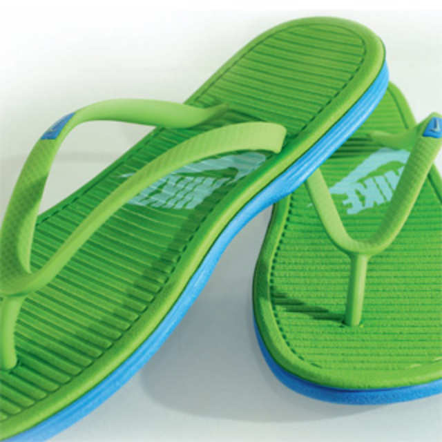 Lime green best sale nike flip flops