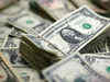 Dollar edges higher as data helps lift Treasury yields