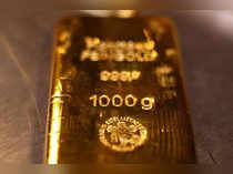 Gold bars and coins are stacked in the safe deposit boxes room of the Pro Aurum gold house in Munich
