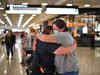Hugs, tears as New Zealand-Australia travel bubble opens