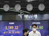 Asian stock markets shake off US tax worries to push higher