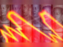 FILE PHOTO: Chinese yuan banknotes are seen behind illuminated stock graph in this illustration