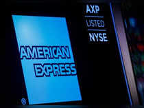 FILE PHOTO: American Express logo and trading symbol are displayed on a screen at the NYSE in New York