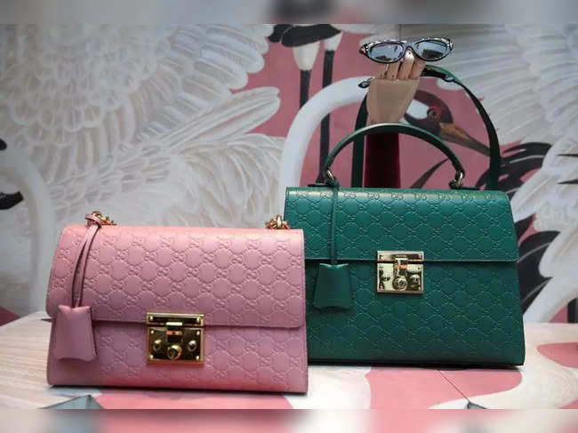 FILE PHOTO: Gucci products are displayed in the window of a store on Old Bond Street in London