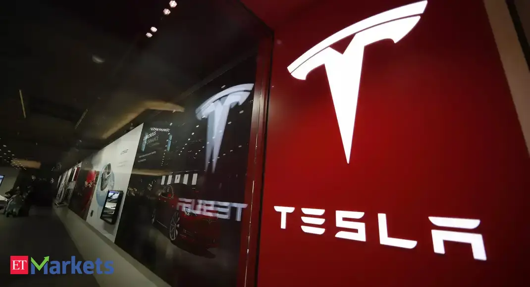 Tesla shares: Tesla shares drop on lack of clear forecast amid global chip crunch - Vimarsana News