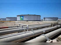 FILE PHOTO: General view of Aramco tanks and oil pipe at Saudi Aramco's Ras Tanura oil refinery and oil terminal
