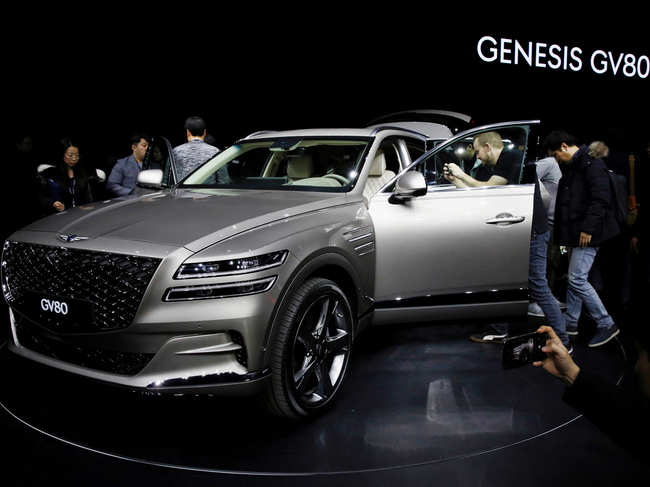 File photo of January 15, 2020:​ Visitors take a look around Hyundai Motor Genesis GV80 SUV during its unveiling ceremony in Goyang, South Korea.