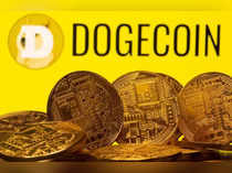 Cryptocurrency representations are seen in front of the Dogecoin logo in this illustration