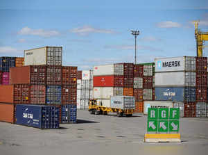 Shipping containers are moved in the Port of Montreal in Montreal, Quebec