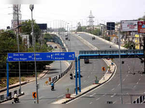 Bhopal: A deserted view of roads during the curfew imposed to curb the spread of...