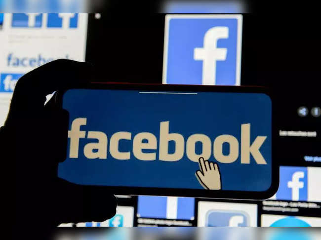 FILE PHOTO: The Facebook logo is displayed on a mobile phone