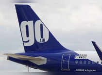 The logo of GoAir airline is pictured on an A320neo aircraft at the builder's headquarters of Airbus in Colomiers near Toulouse
