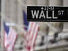 Wall Street closes lower on weak telecom stocks despite strong retail earnings