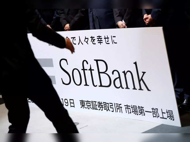 FILE PHOTO: SoftBank Corp. placard is prepared during a ceremony to mark the company's debut on the Tokyo Stock Exchange in Tokyo