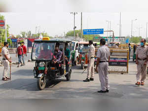Gurugram: Haryana Police personnel screen for lockdown  at Dundahera-Kapashera D...