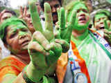 TMC supporters celebrate the victory