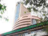 Sensex ends 14 points lower, Nifty settles above 15,200; Asian Paints gains 3%
