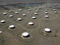 FILE PHOTO: Crude oil storage tanks are seen from above at the Cushing oil hub in Cushing