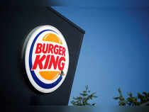 FILE PHOTO: The Burger King company logo stands on a sign outside a restaurant in Bretigny-sur-Orge, near Paris