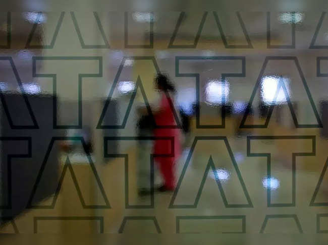 An employee of Tata Consultancy Services (TCS) works inside the company headquarters in Mumbai