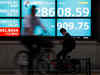 Asian shares tick up US data bolsters reopening hopes