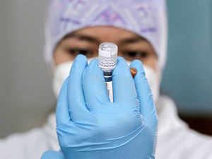 covid vaccine reuters
