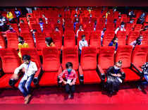 New Delhi: Underprivileged children watch the special screening of a film at PVR...