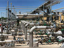 FILE PHOTO: Equipment used to process carbon dioxide, crude oil and water is seen at an Occidental Petroleum Corp enhanced oil recovery project in Hobbs