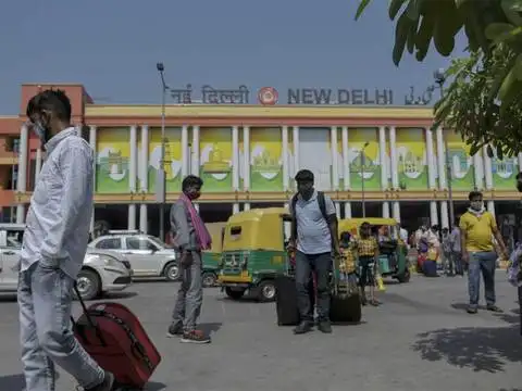 Passengers at New Delhi railway station