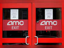 FILE PHOTO: FILE PHOTO: Closed signs are seen on an AMC Theatre during the outbreak of the coronavirus disease (COVID-19), in New York